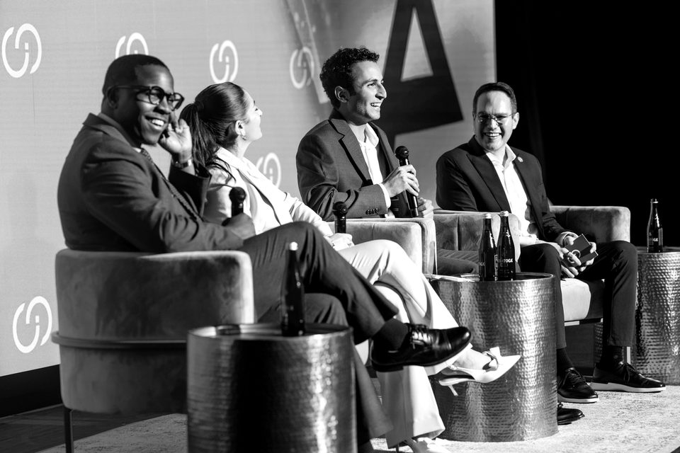 Geller Senior Fellows and their moderator talk on the Summit stage.